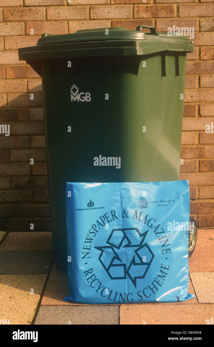 Household waste bin and newspaper recycling bag Stock Photo Alamy