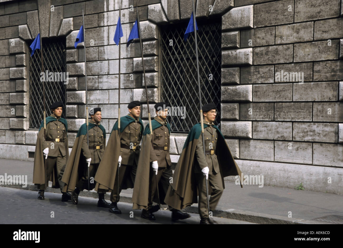 Italy Rome A Group Of Military Men Walking In A Line In The Street With ...