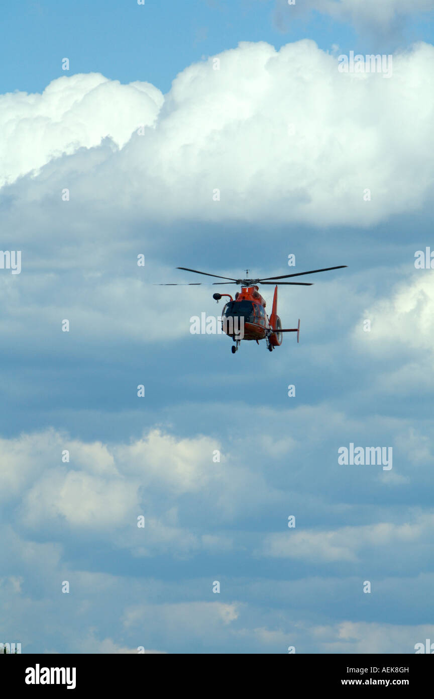 A US Coast Guard HH 65B SAR Helicopter demonstrates a search and rescue mission at Binghamton Airshow New York Stock Photo