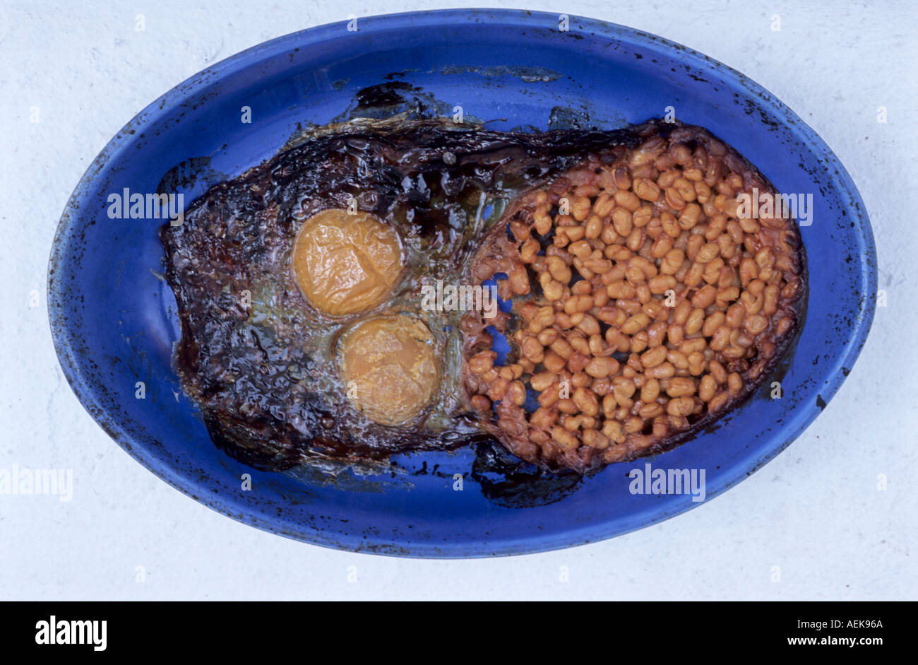 Overcooked eggs and beans Stock Photo 2537833 Alamy