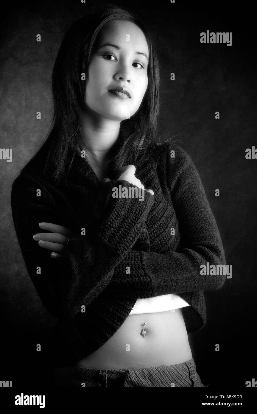 Studio portrait of a young Asian woman Stock Photo - Alamy