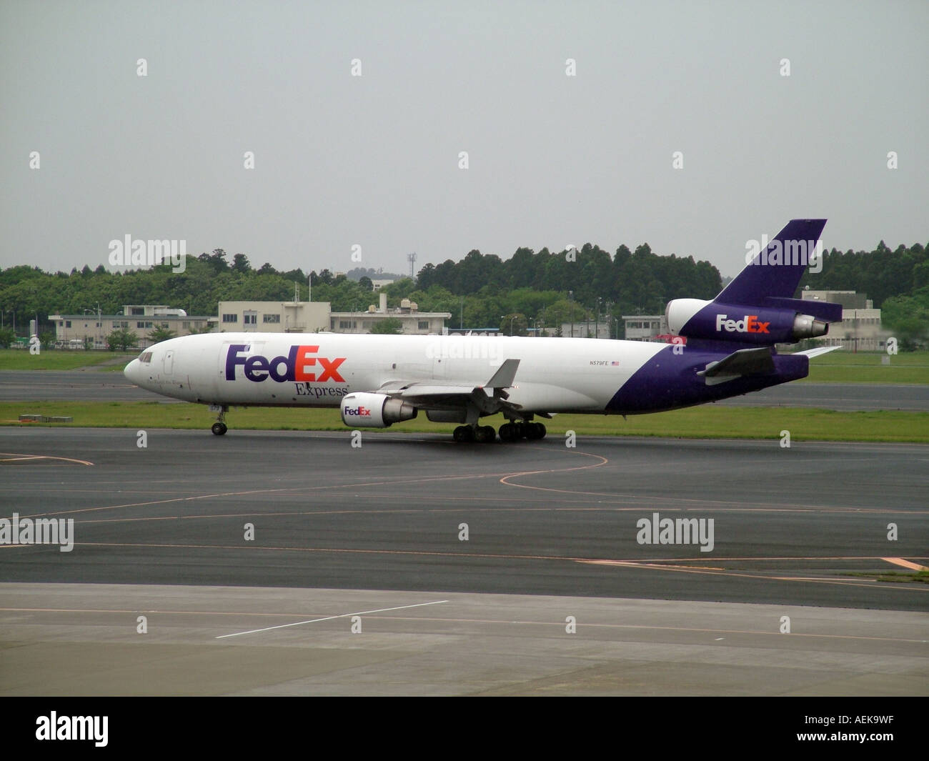 FedEx cargo plane on runway Tokyo Airport Japan N579FE Stock Photo