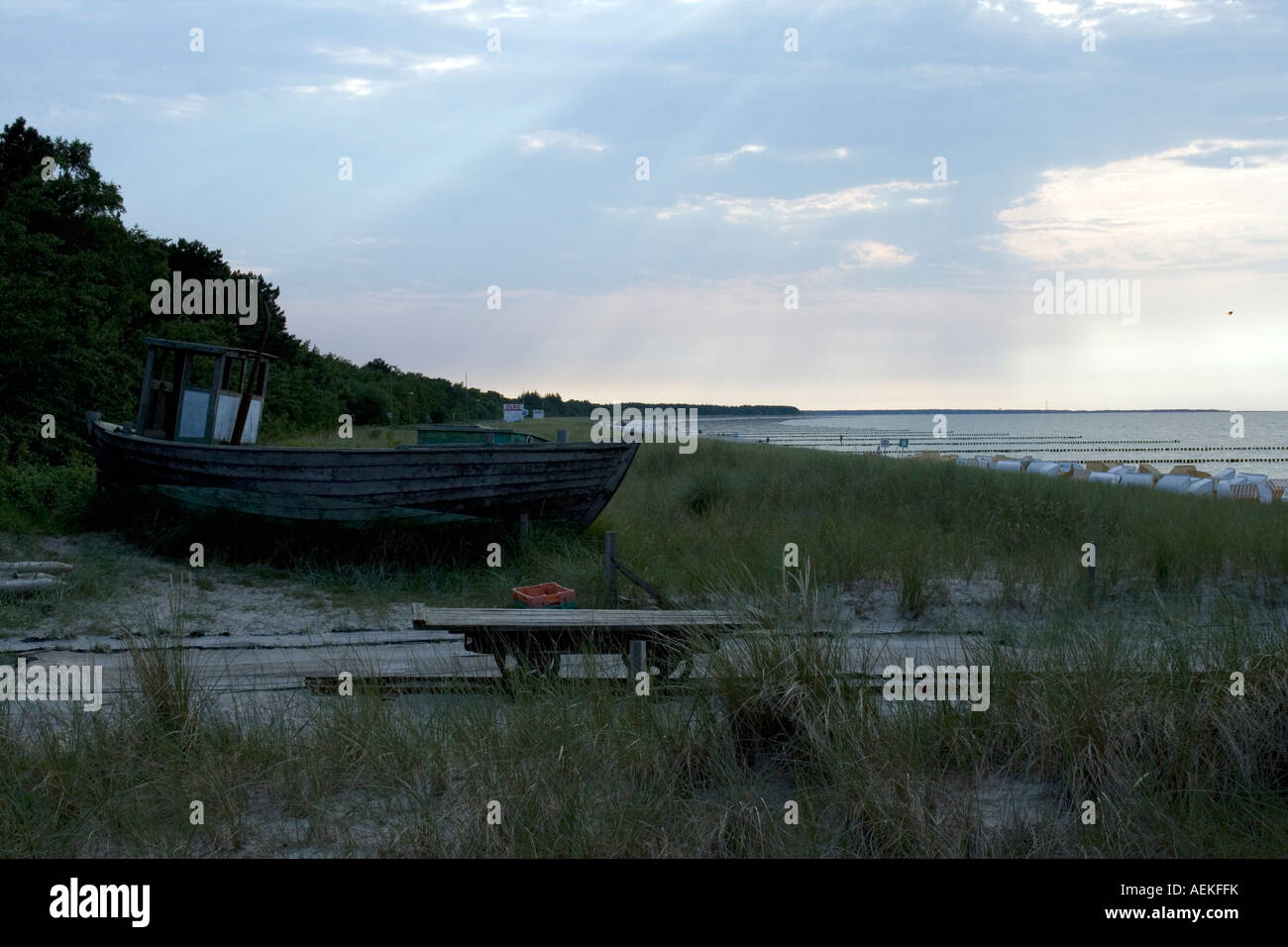 Wrecked fishing boat on the beach Stock Photo - Alamy
