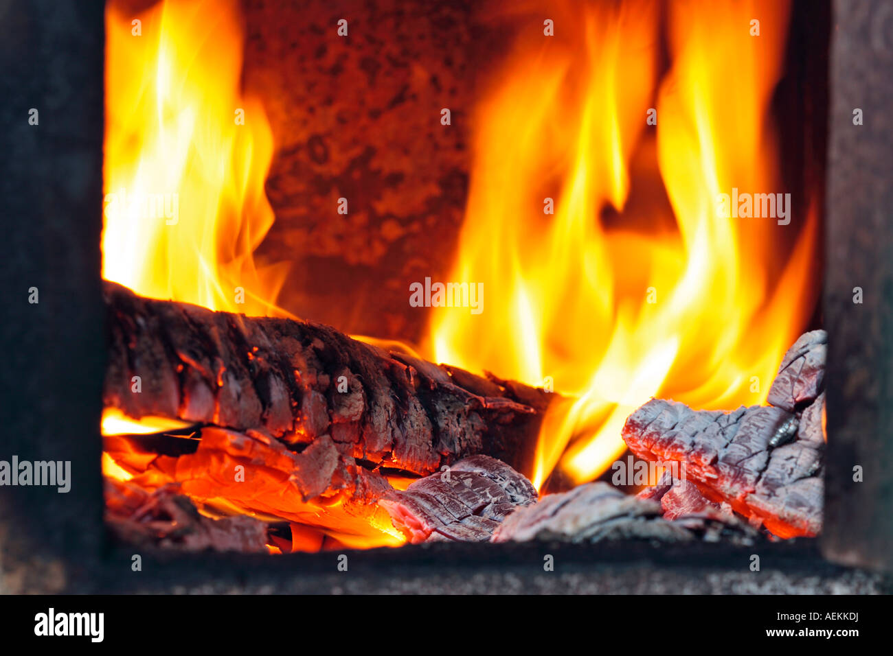 Wood burning in oven Stock Photo Alamy