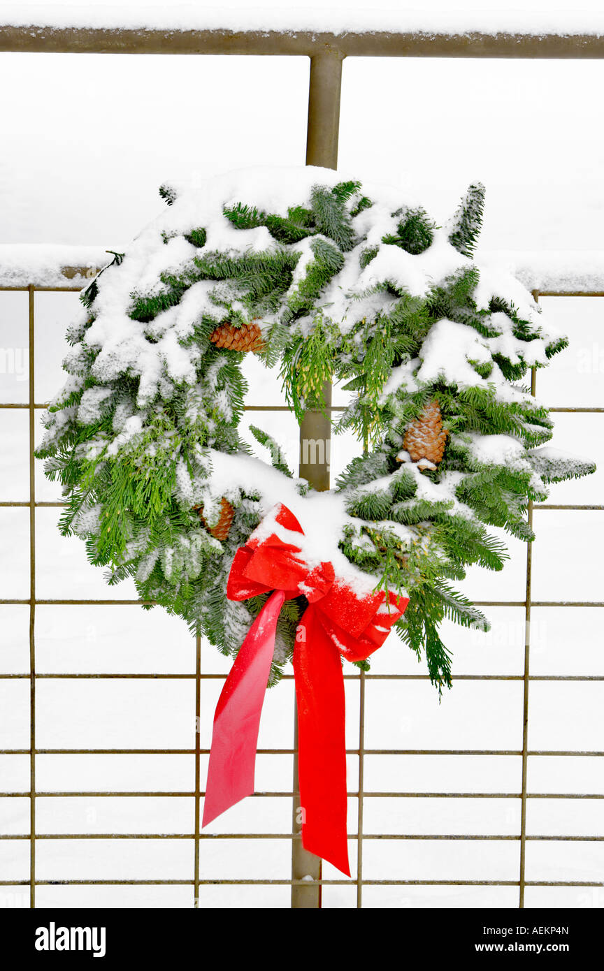 Gate with Christmas wreaths and decorations Stock Photo - Alamy