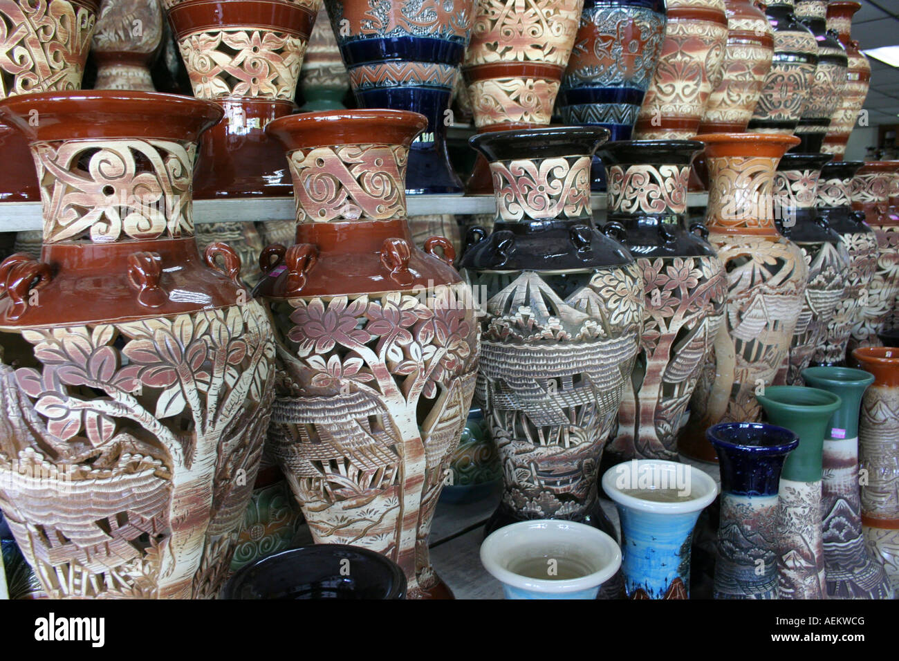 Flower pots with traditional motif for sale in Sarawak, Malaysia Stock  Photo - Alamy