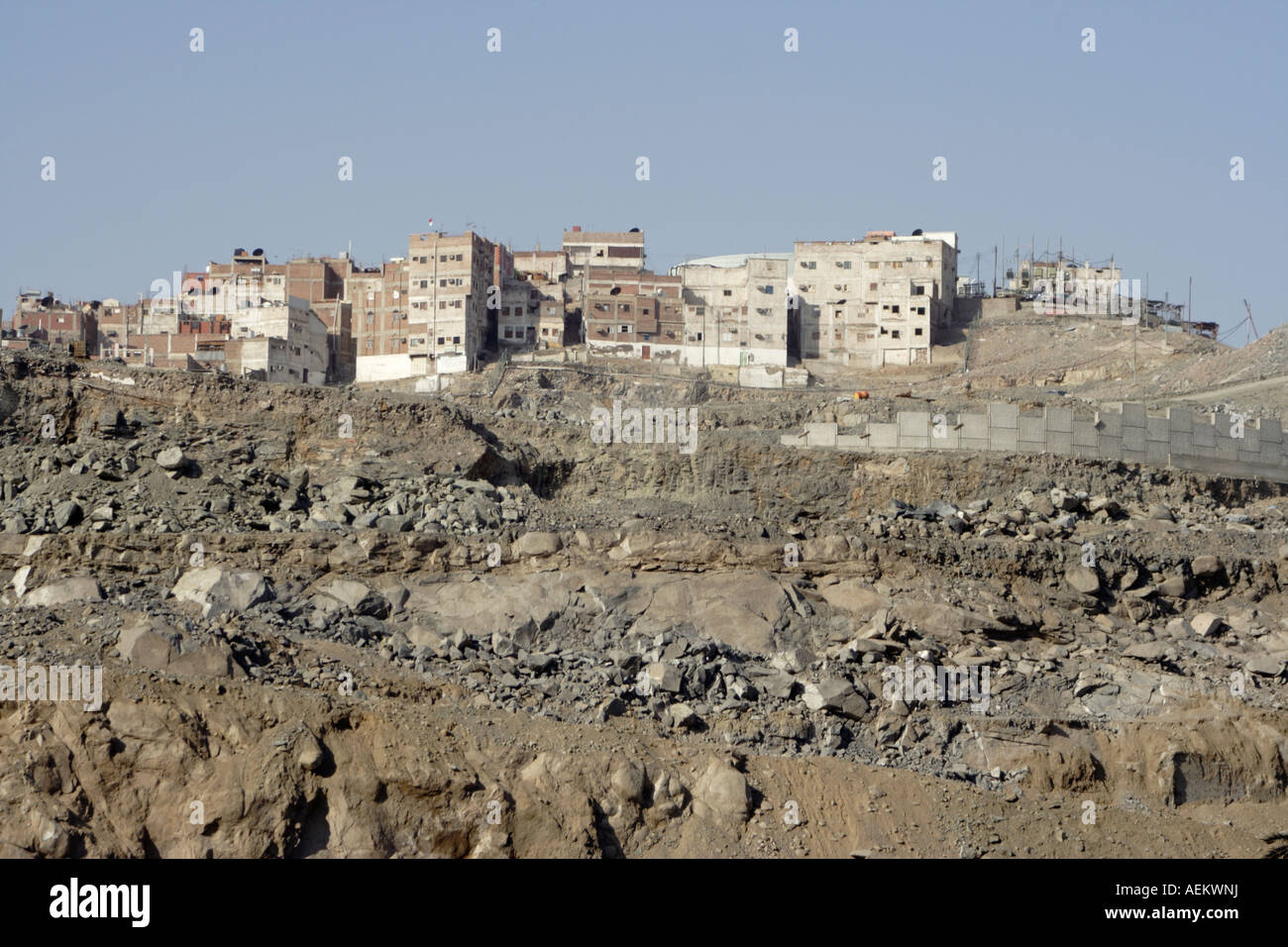 Old houses built on rocky hillside in the holy city of Mecca, Saudi