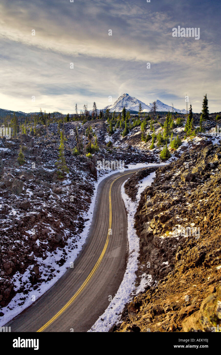Old McKenzie Highway 242 with first snowfall of season Central Oregon Stock Photo