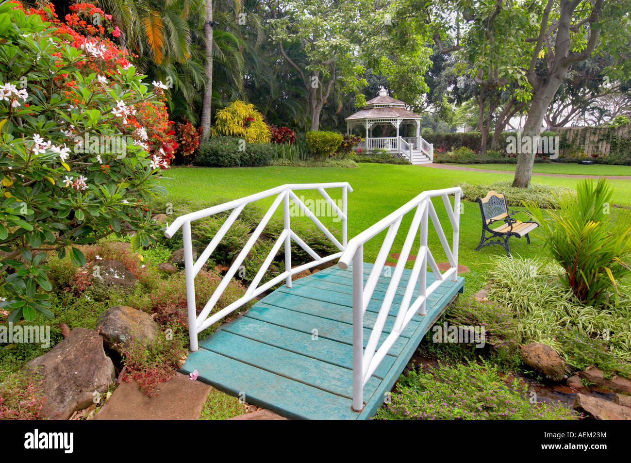 Gardens with bridge gazebo and bench at Maui Tropical Plantation Maui