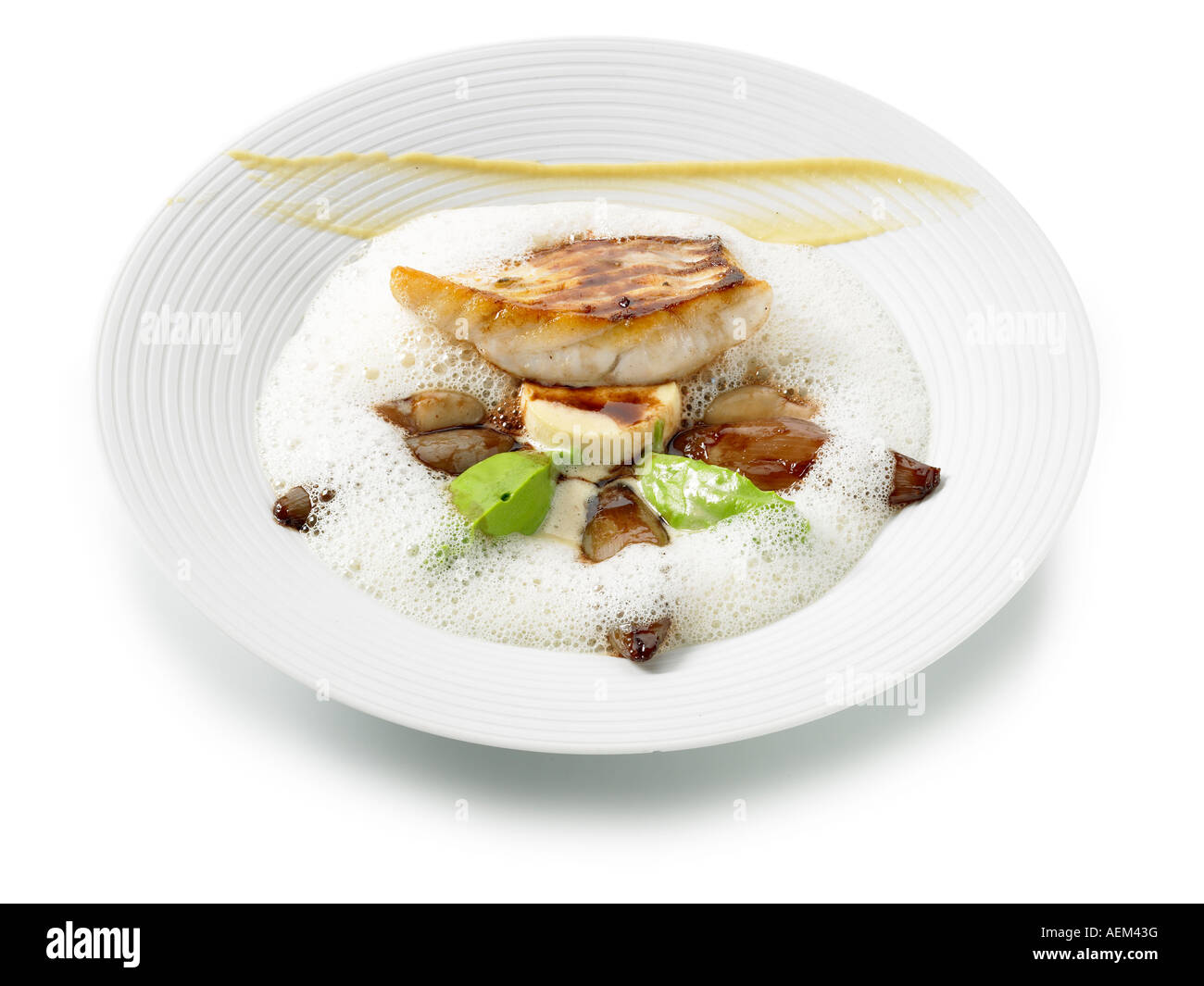 Roasted turbot with red wine and oyster sauce and braised shallots