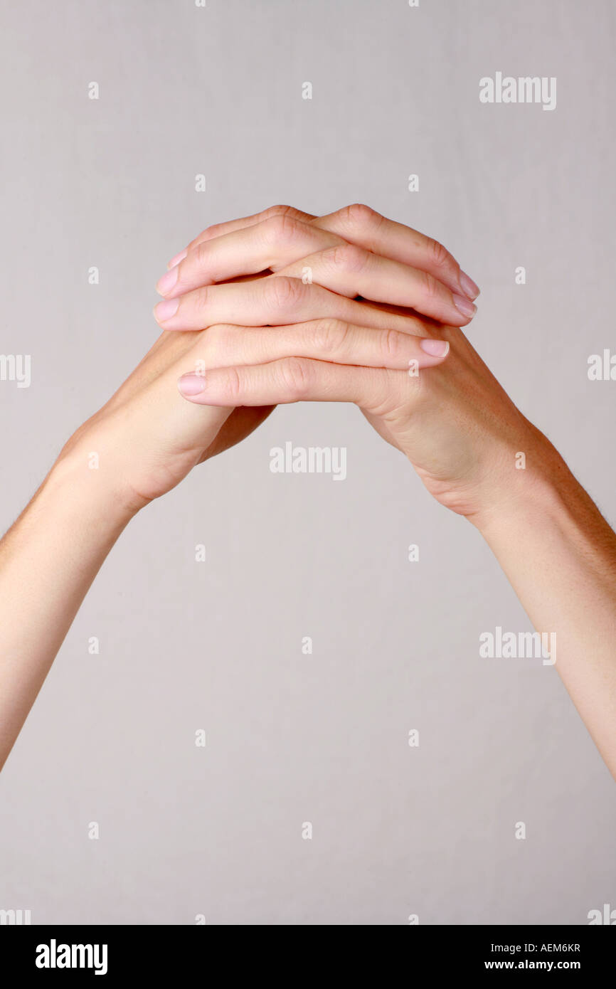 Fingers interlocked hires stock photography and images Alamy