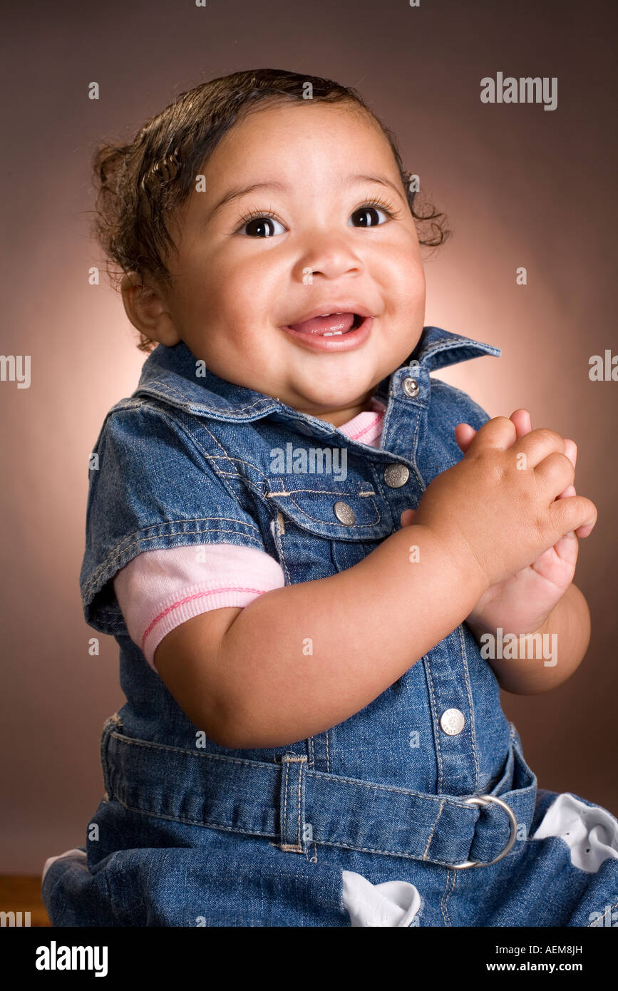 Baby girl having a laugh Stock Photo