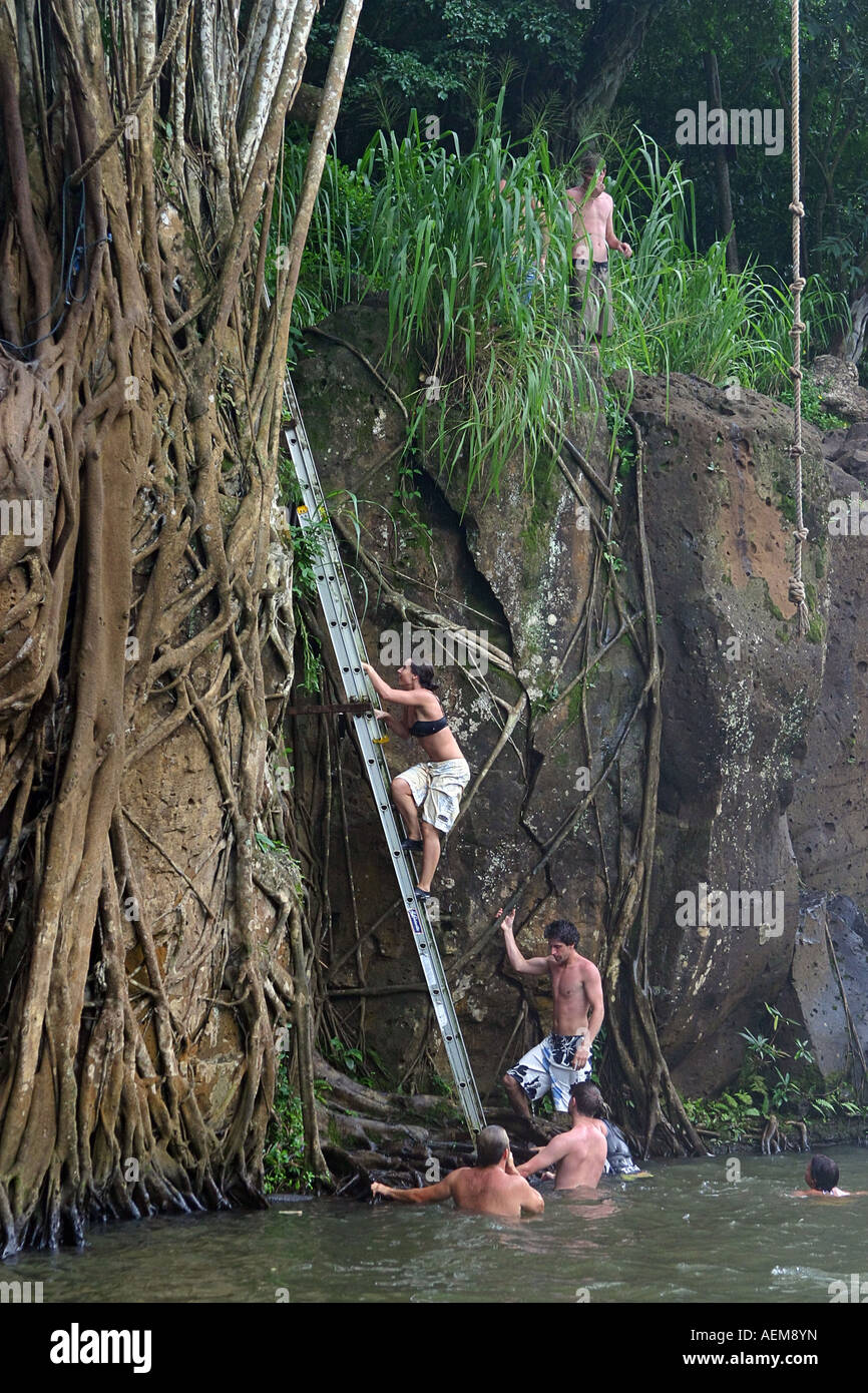 Photo by Yvette Cardozo Rope swing at Kipu Falls Kauai HI Stock Photo
