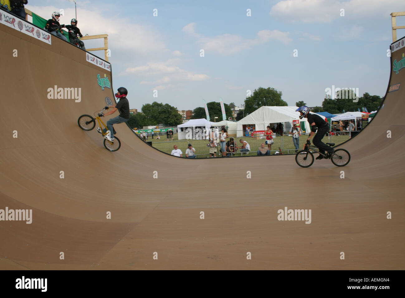 BMX riders on a ramp at the Sprite Urban Games Clapham Common London ...