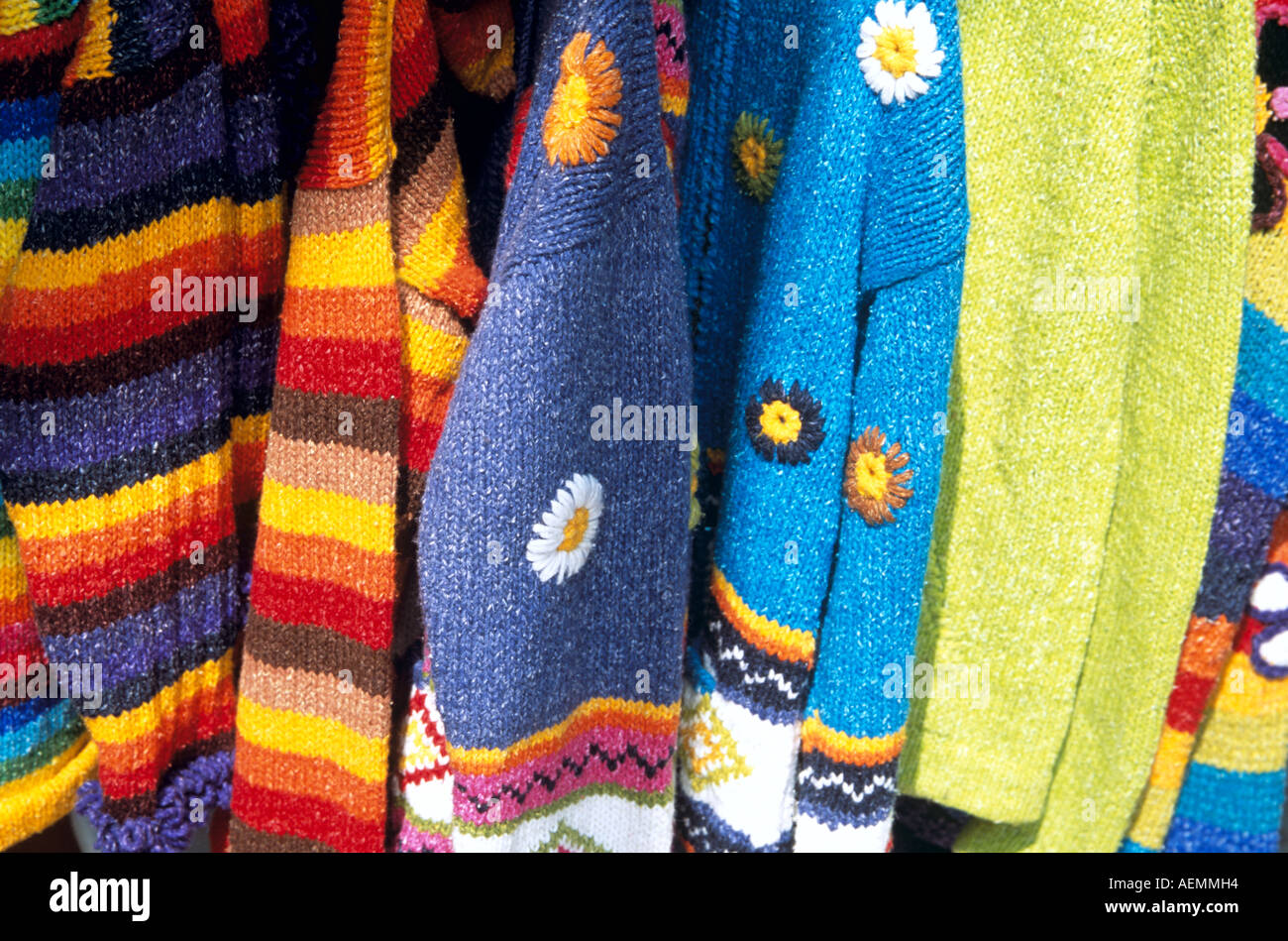 Colourful knitwear for sale outside clothing shop, Inka Market, Lima, Peru Stock Photo