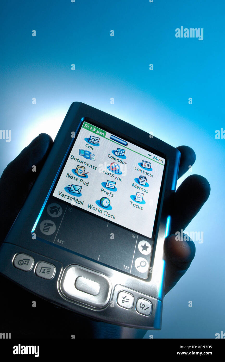 PDA PALM PILOT ORGANIZER WITH HANDS Stock Photo Alamy