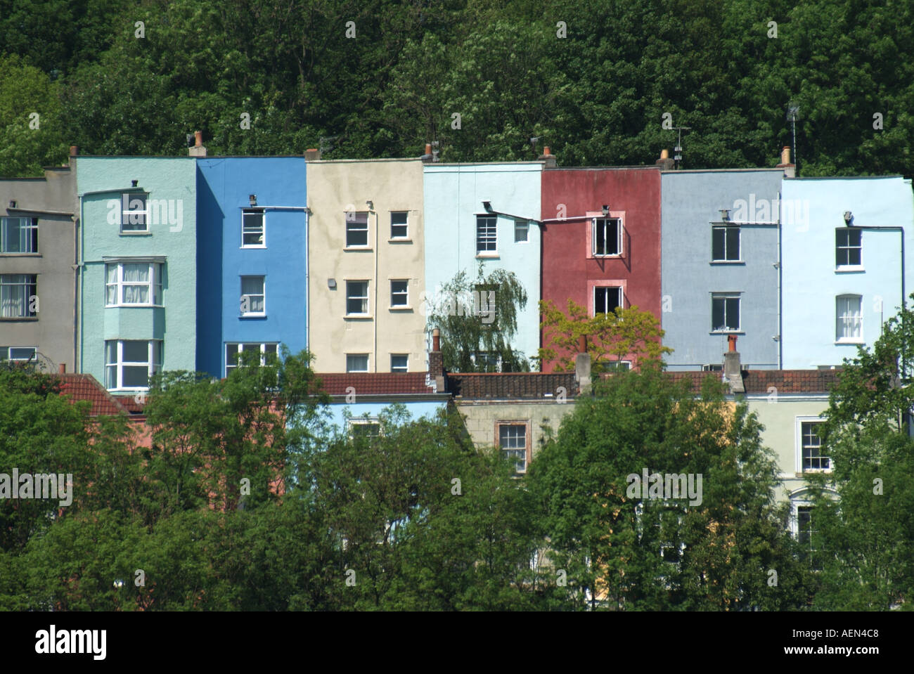 Bristol terraced older style colour washed dwellings close to the Baltic Wharf area Stock Photo