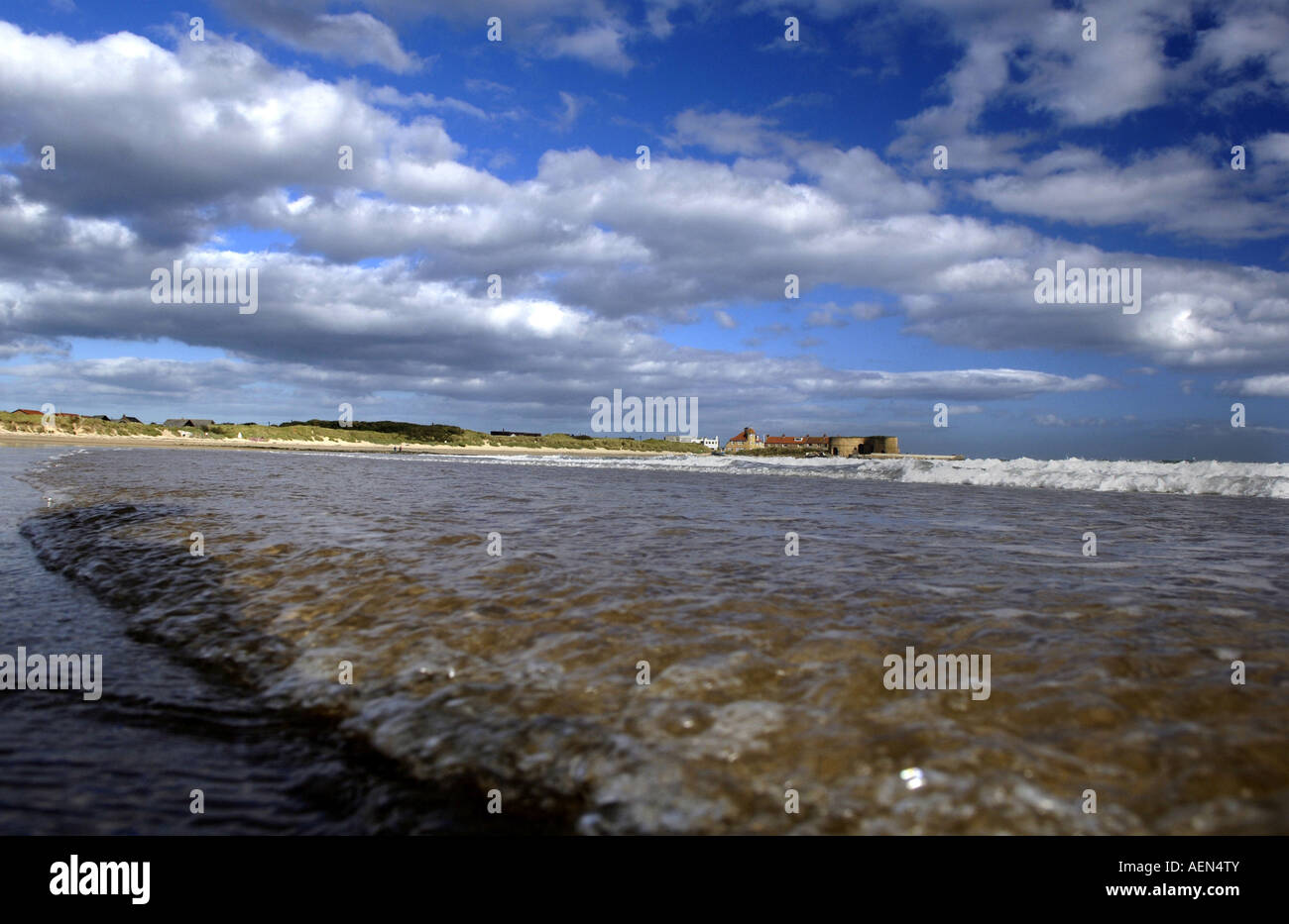 beadnall bay Northumberland  with waves and harbour fort Stock Photo