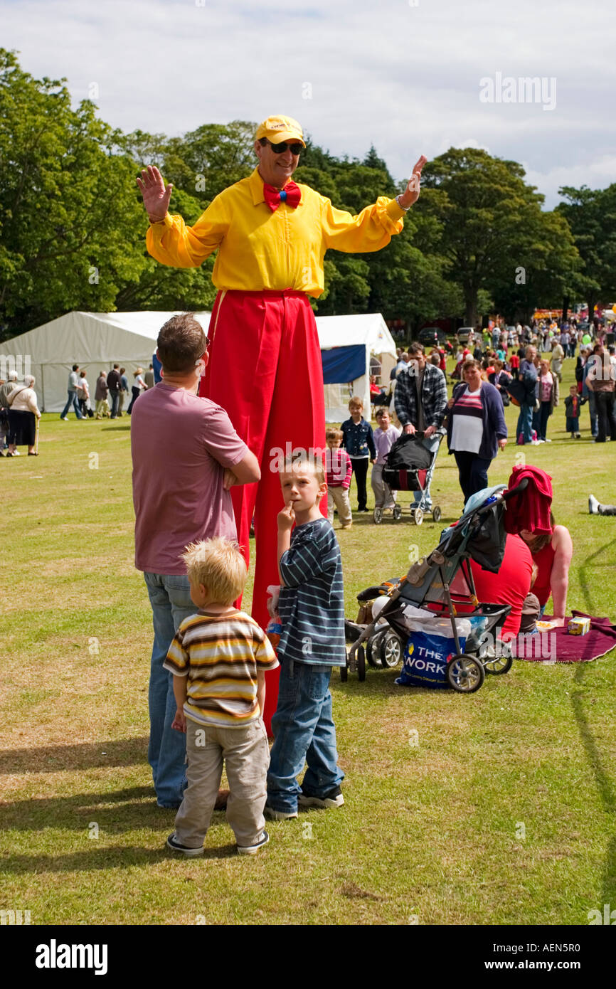 Clown stilts hi-res stock photography and images - Alamy