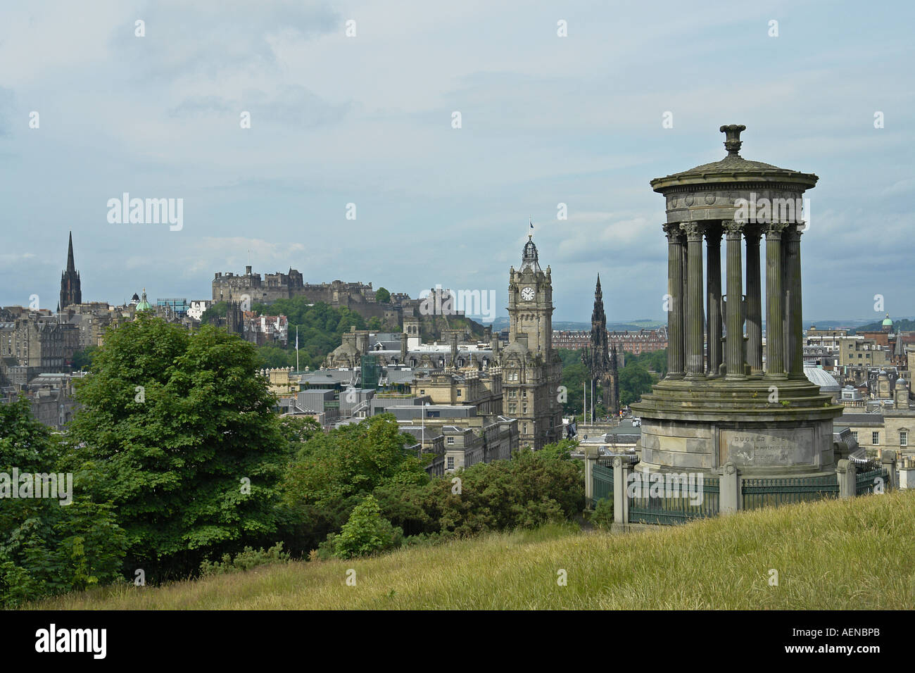 The classic view of the centre of Edinburgh from Calton Hill with Dugald Stewart Memorial right Stock Photo
