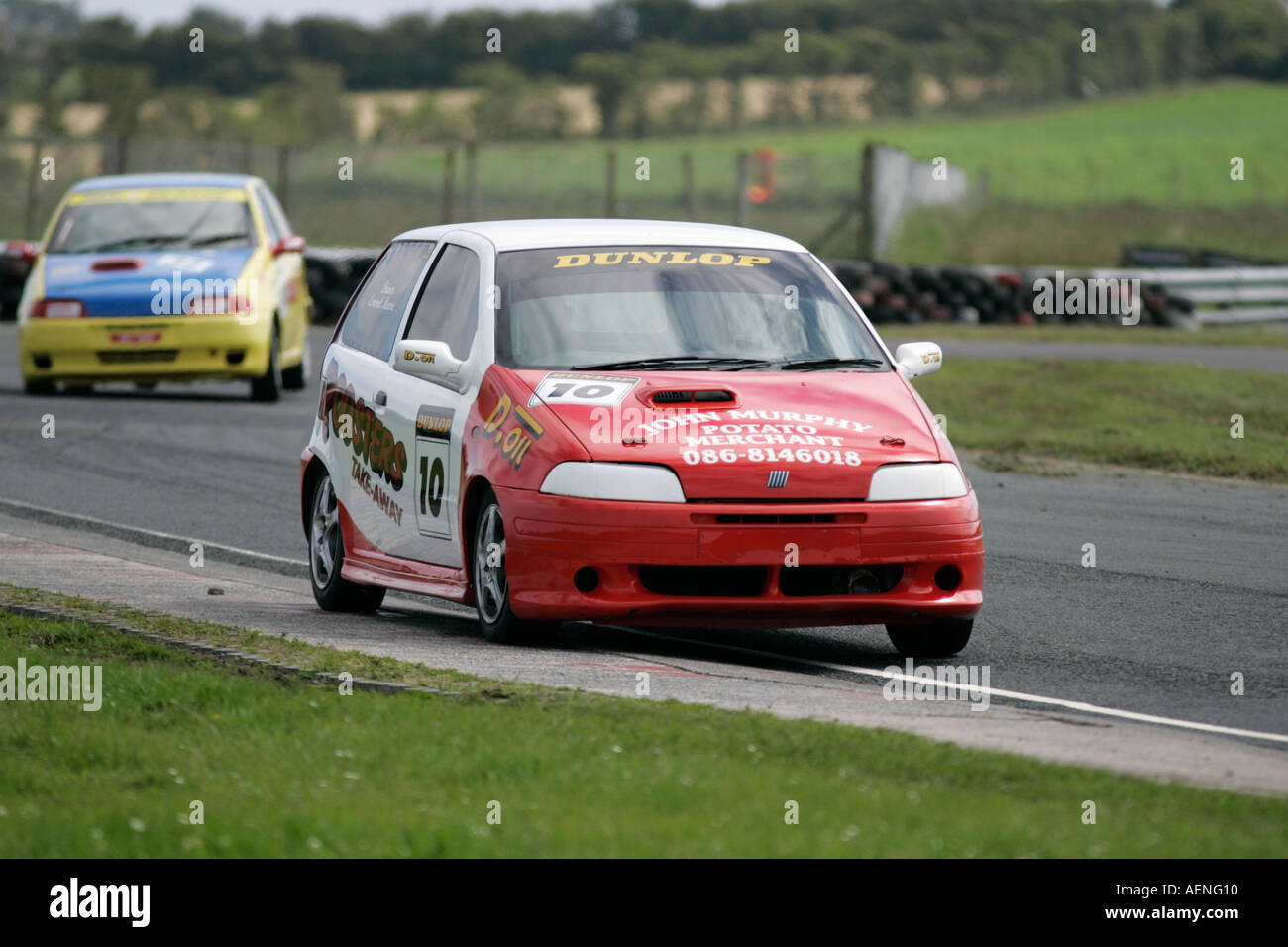 Fiat Uno Punto racing at Kirkistown Circuit county down Northern Ireland - Stock Image