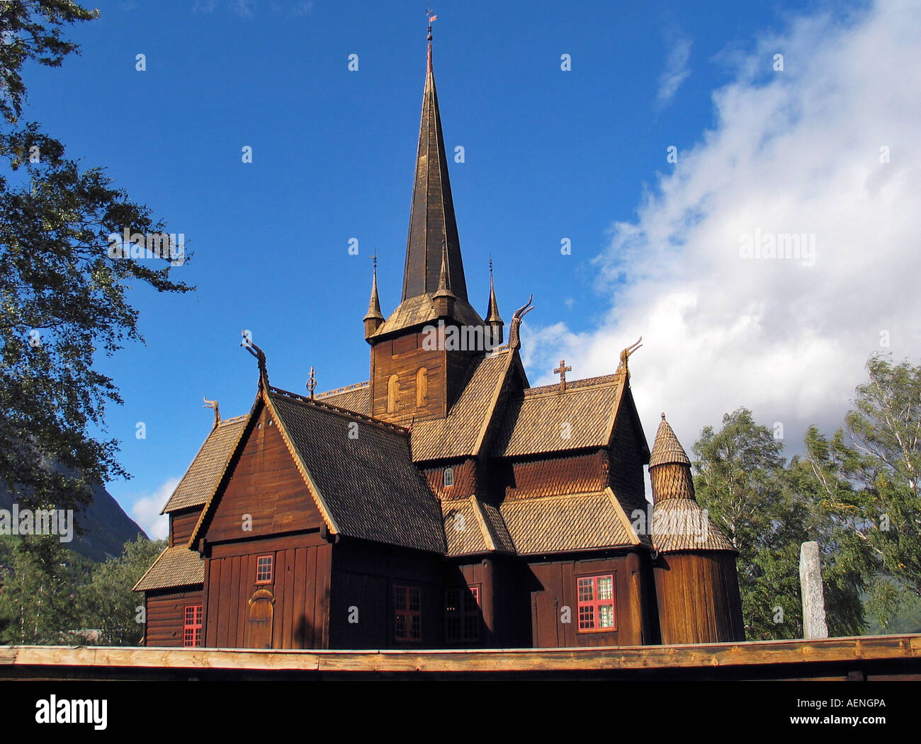 Stave church Lom, Norway against blue sky during Indian summer Stock Photo