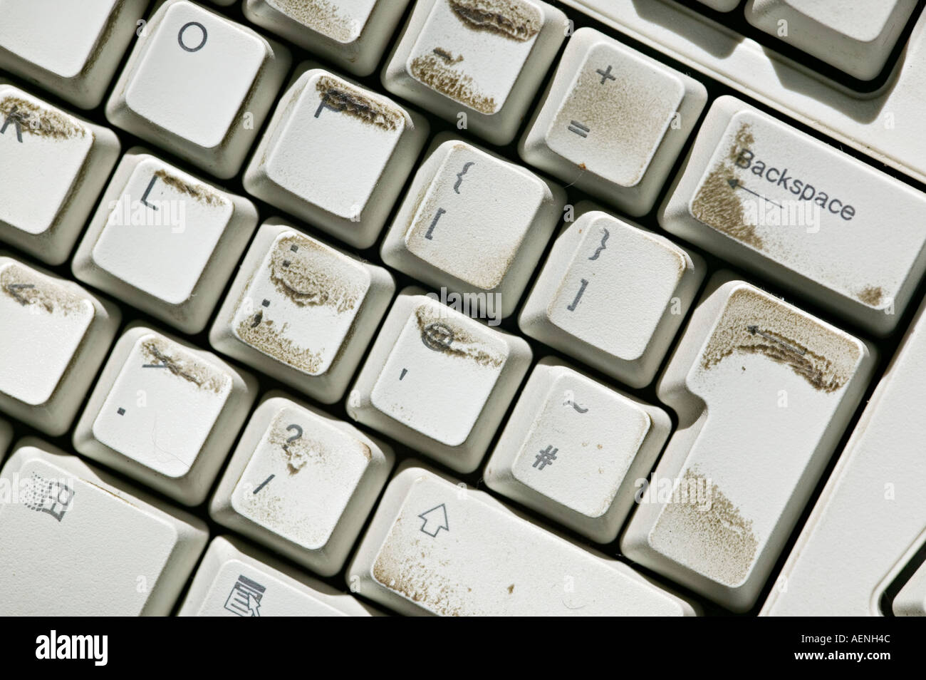 Dirty computer keyboard keys that require cleaning Stock Photo