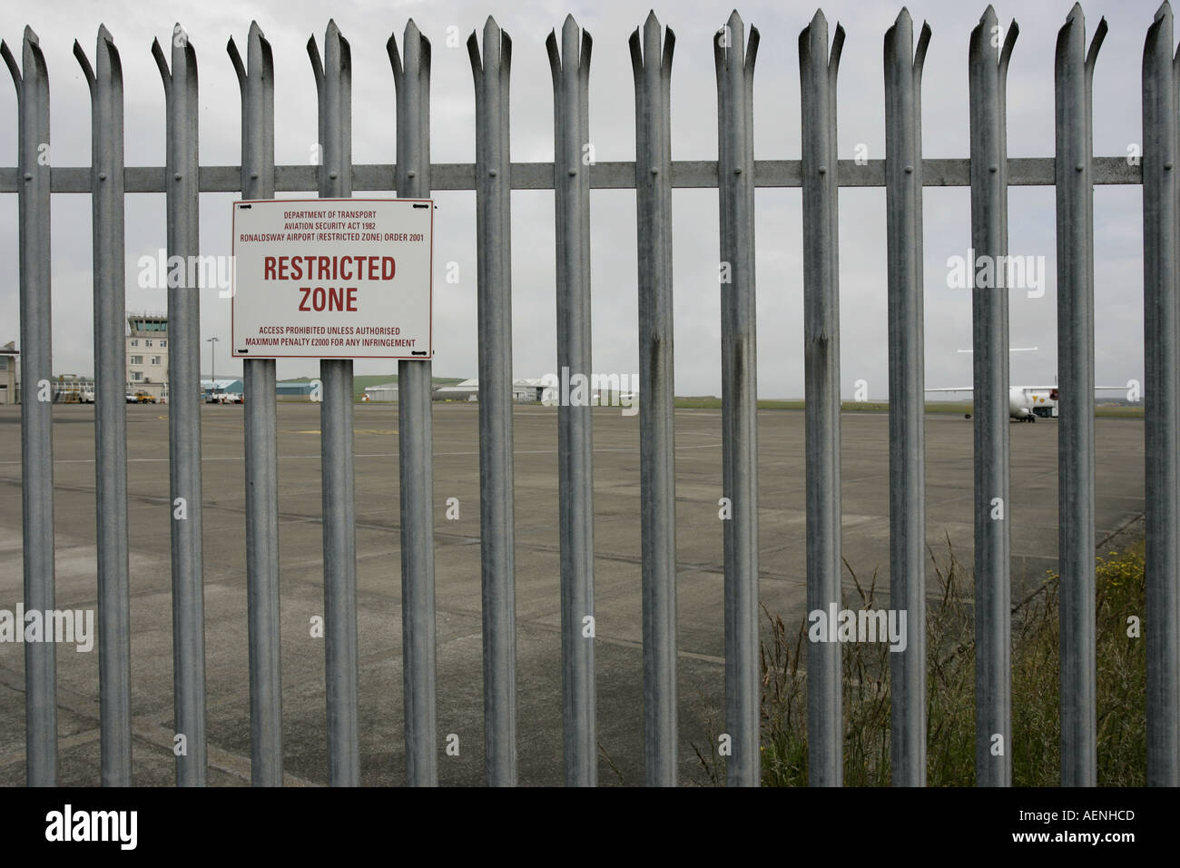 metal fence and restricted area security sign Ronaldsway airport IOM