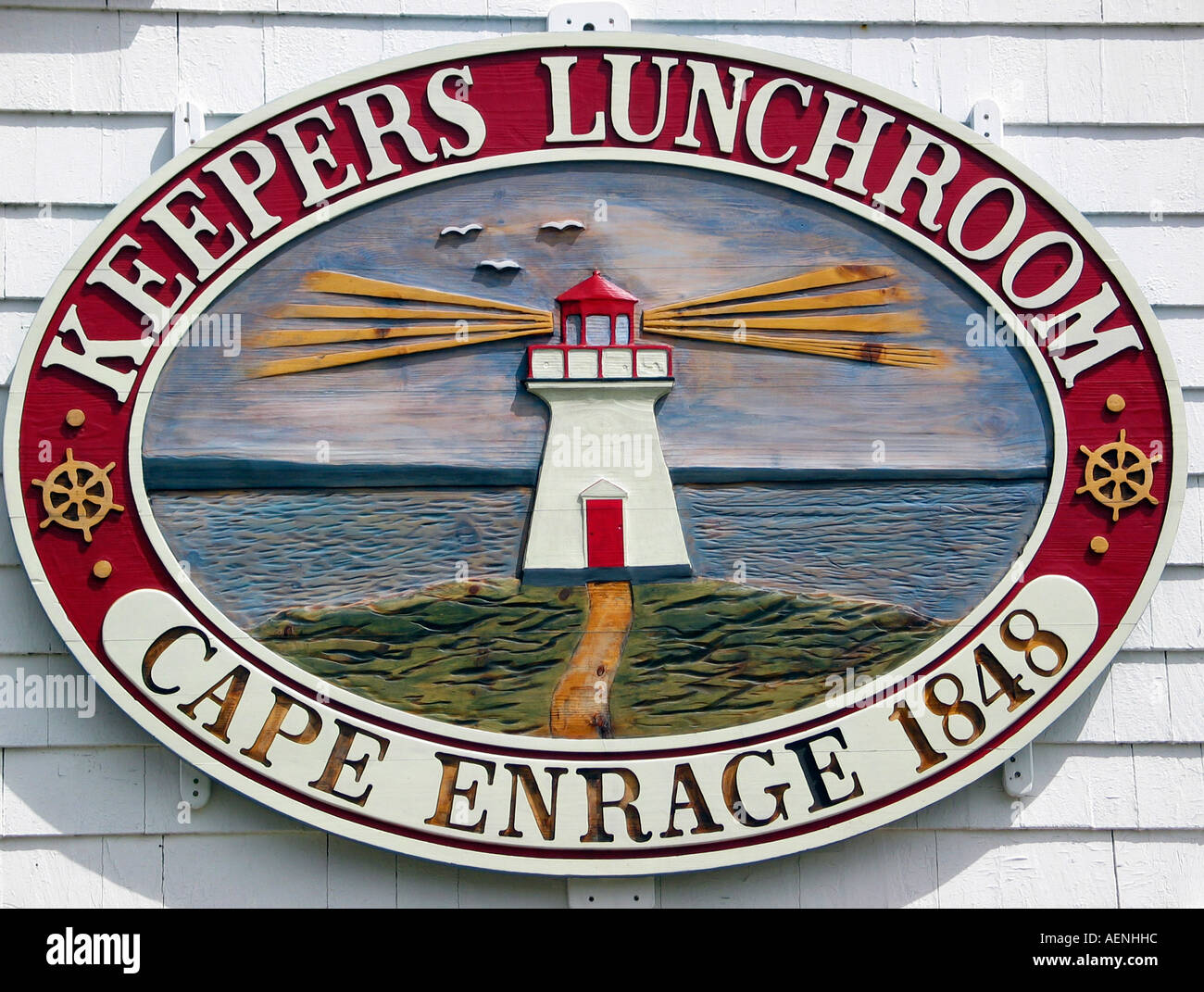 Wooden plaque/sign on the Lighthouse keepers house at Cape Enrage New