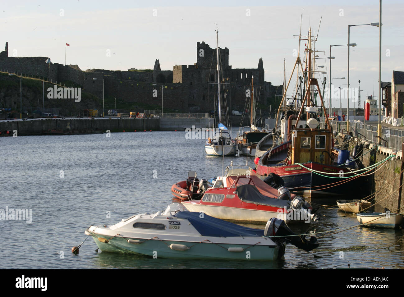 Peel Castle and harbour Peel Isle of Man IOM isle of man Stock Photo Alamy