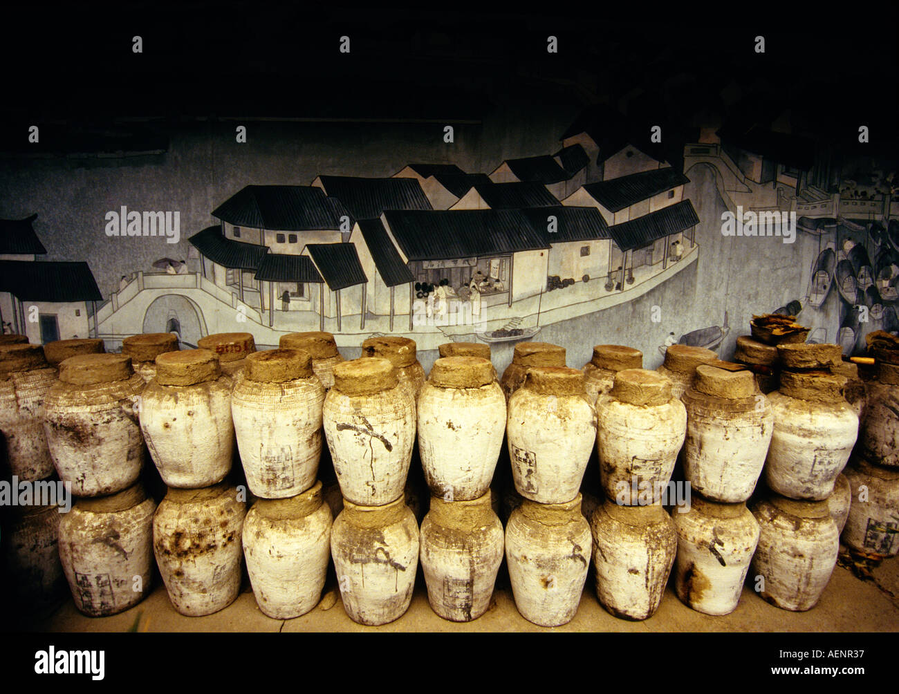 Shaoxing Zhejiang China Mural and wine jars at the Xianheng Tavern location of a Lu Xun story  Stock Photo