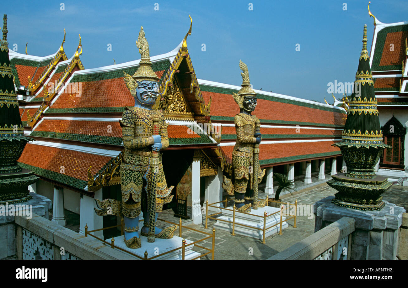 Temple guards and rooftops, Grand Palace, Bangkok, Thailand Stock Photo