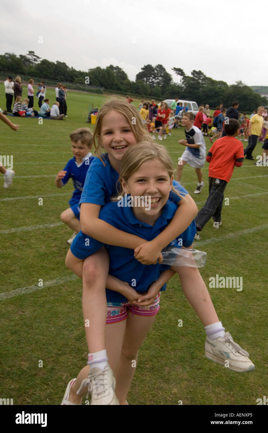 Two young girls at School sports day Ysgol Gymraeg welsh primary  school Aberystwyth Ceredigion Wales UK Stock Photo