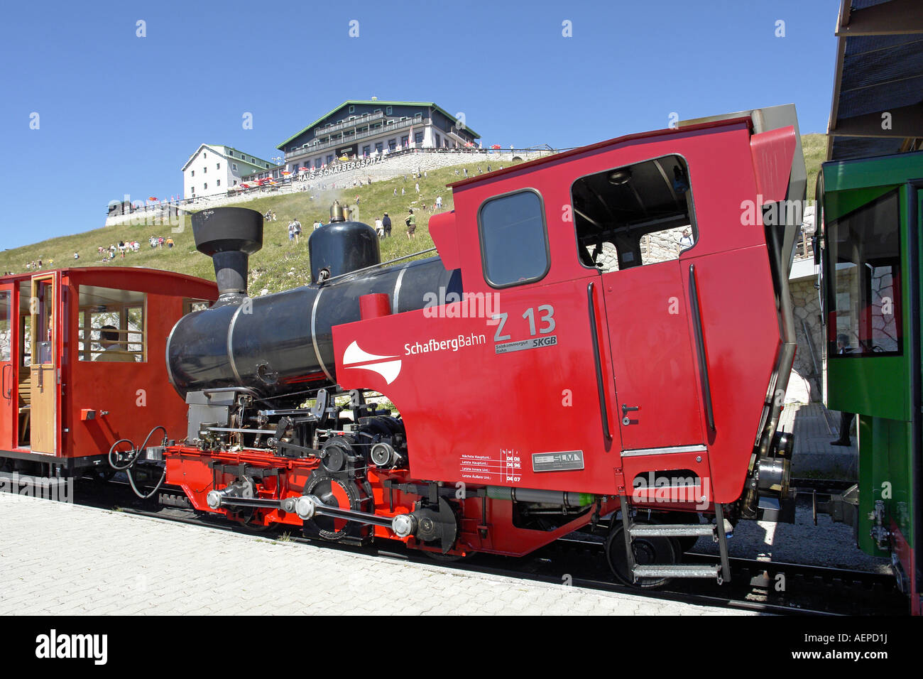 Steam engine Z 13 with red coaches waiting to take passengers from Schafberg to St. Wolfgang on a sunny summer day Stock Photo