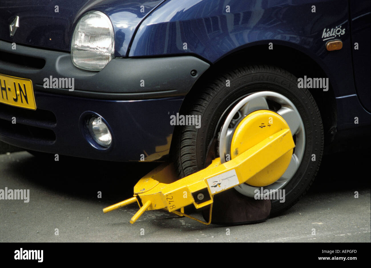 Amsterdam wheel clamp on car Stock Photo
