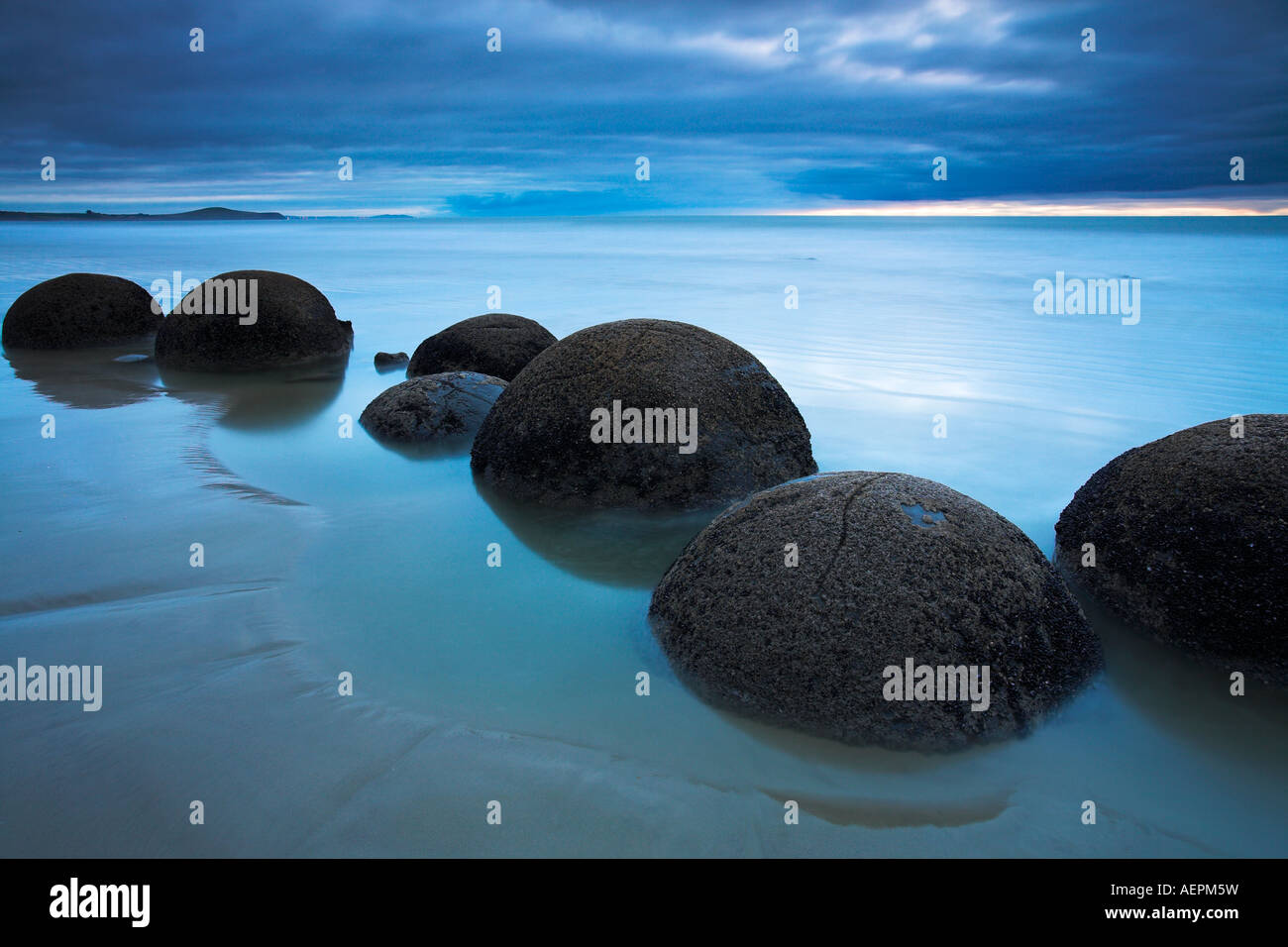 The unusual circular Moeraki boulders along the Otago Coast, New Zealand Stock Photo