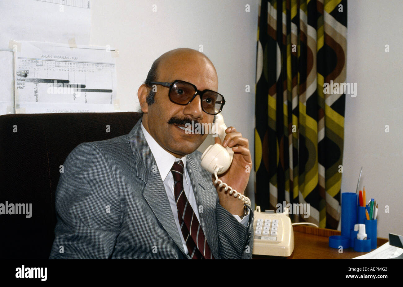 Editor On Telephone Egyptian Newspaper Stock Photo