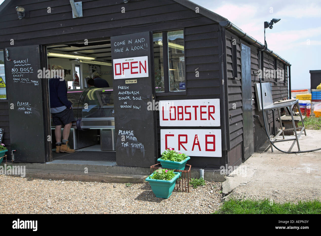 Fresh fish for sale from wooden shed on beach Aldeburgh, Suffolk Stock