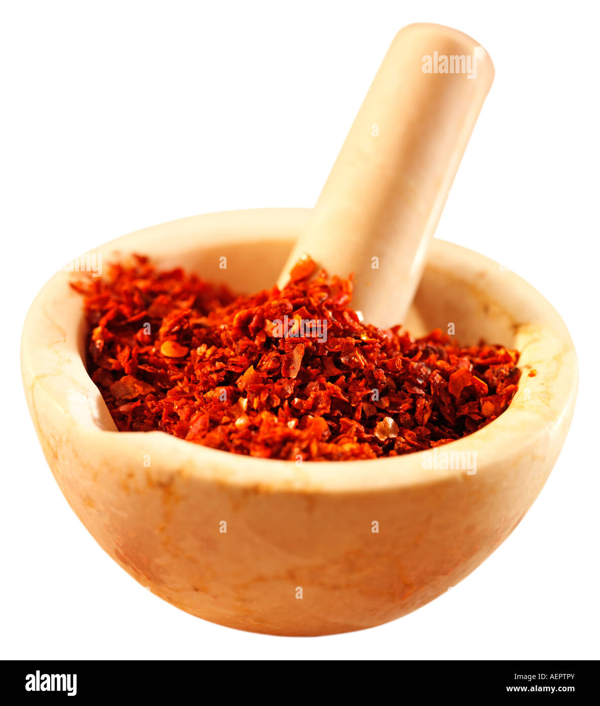 RED PEPPER FLAKES IN PESTLE AND MORTAR CUT OUT Stock Photo Alamy