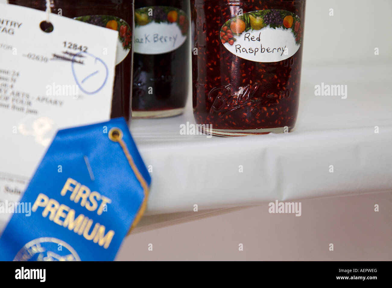 ILLINOIS Grayslake Blue ribbon awarded to winning agriculture product at Lake County Fair raspberry preserves Stock Photo