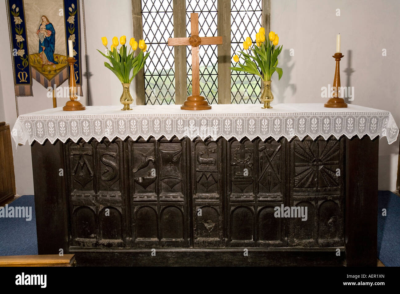 UK Cornwall Boscastle St Symphorians church altar made from ancient carved wooden pew ends Stock Photo