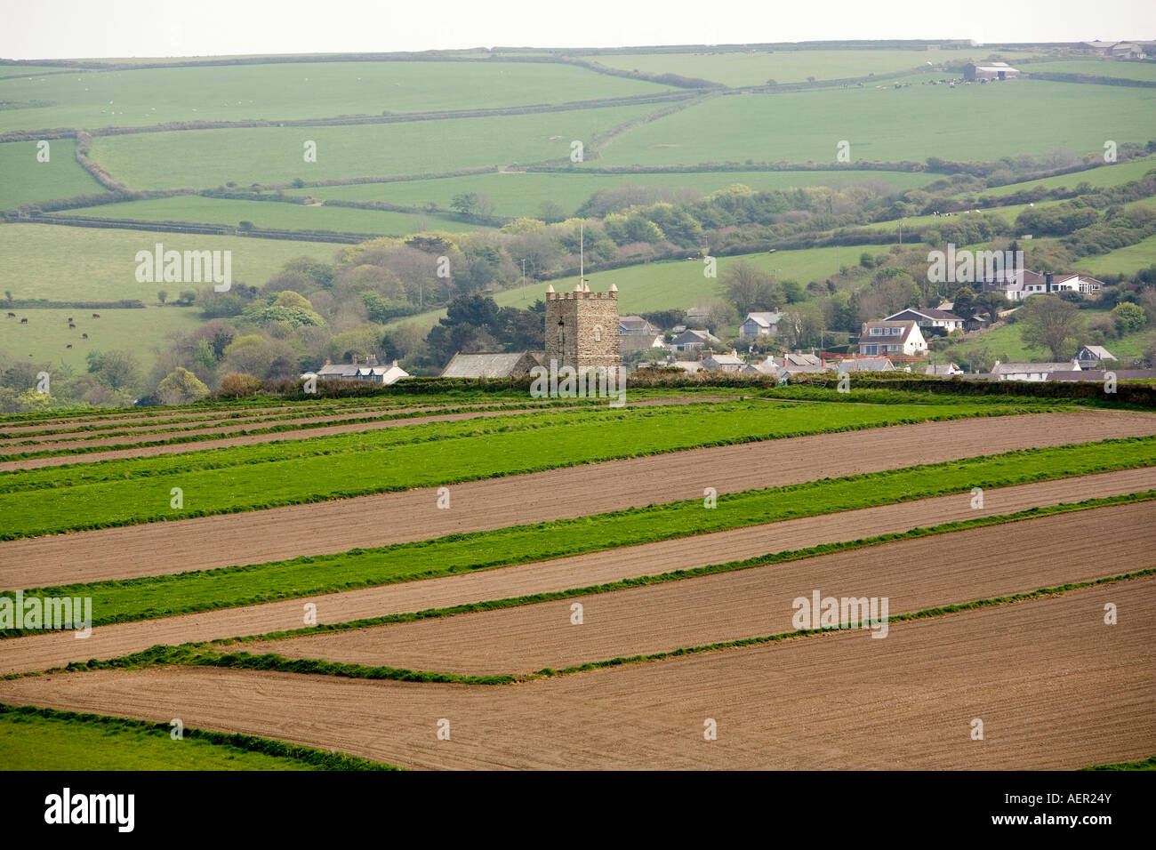 UK Cornwall Boscastle Forrabury Common St Symphorians church beyond the stitches ancient strip field system Stock Photo