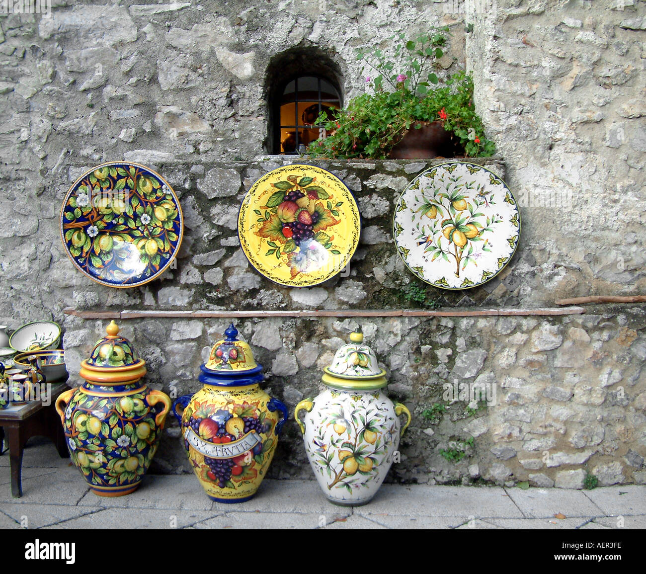 Traditional ceramic plates and pots on sale in the village square at