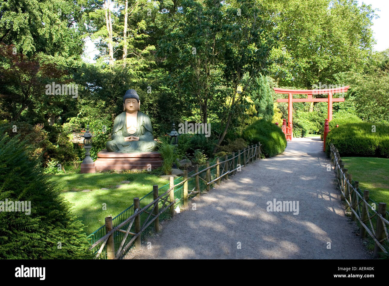 Buddha Statue and Chinese Arch in Hagenbeck Zoological Garden Stock Photo