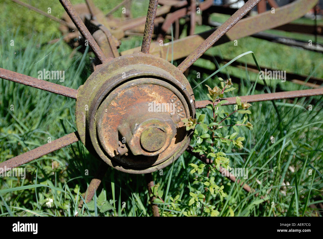 Rusting agricultural farm equipment seed drill Union farm Gressenhall