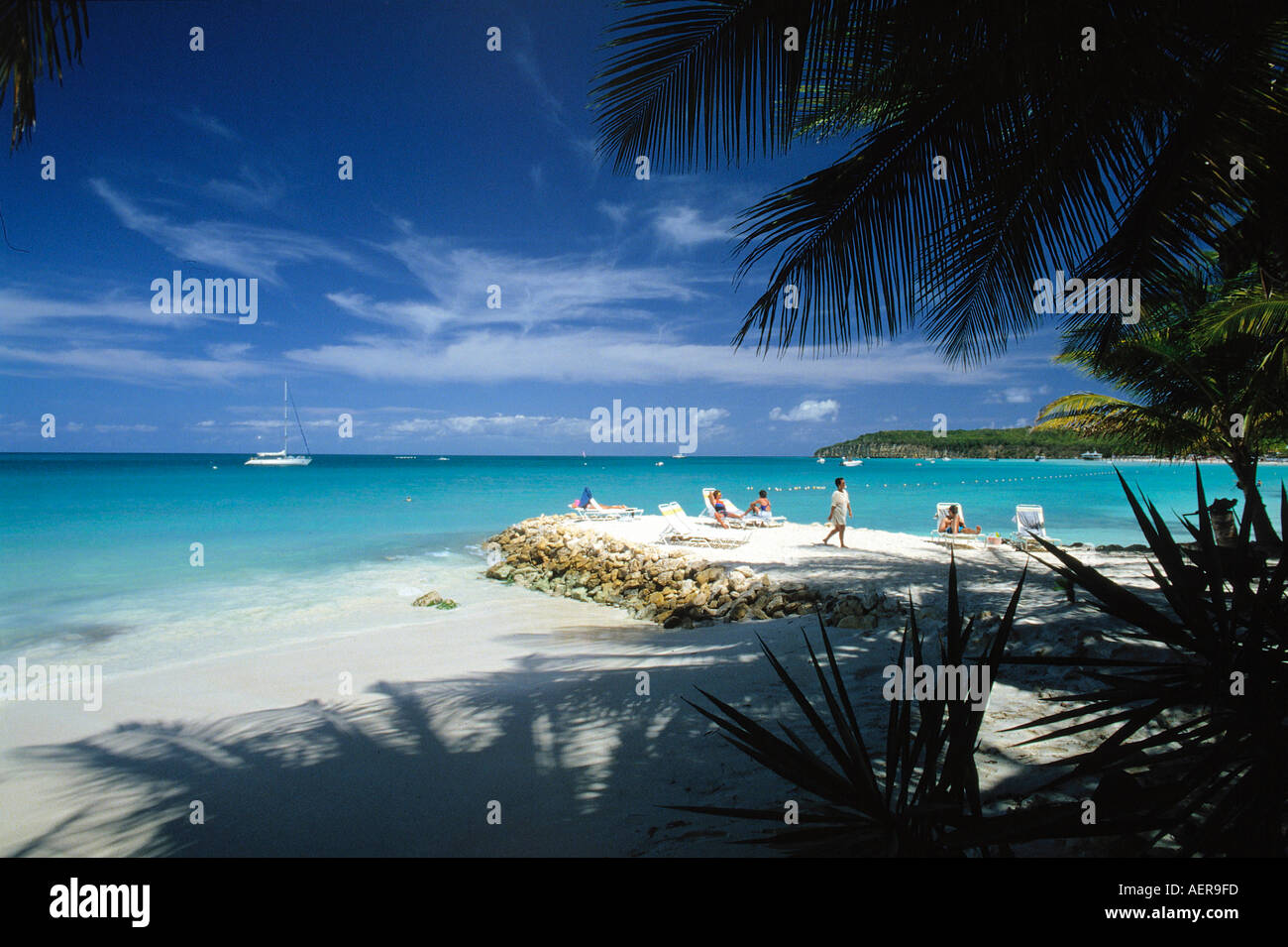 sunbathing at beach island of antigua archipelago of the lesser antilles caribbean Stock Photo
