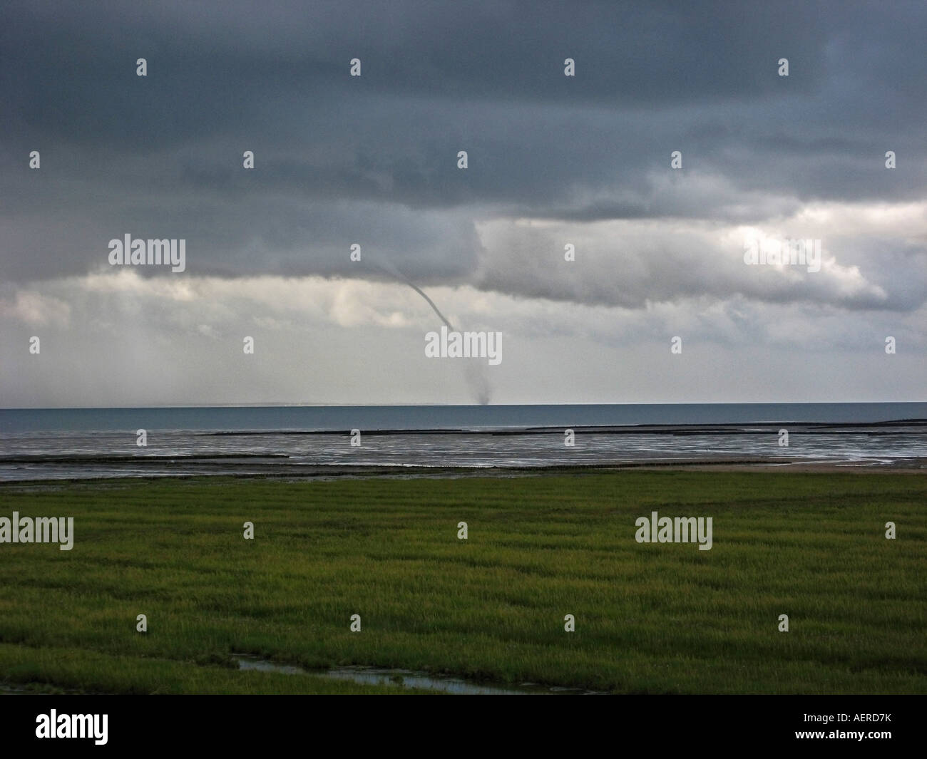 Windhose ueber der Nordsee vor Sylt zwischen Hoernum und Morsum mini Tornado over the Northsea close at Sylt Stock Photo