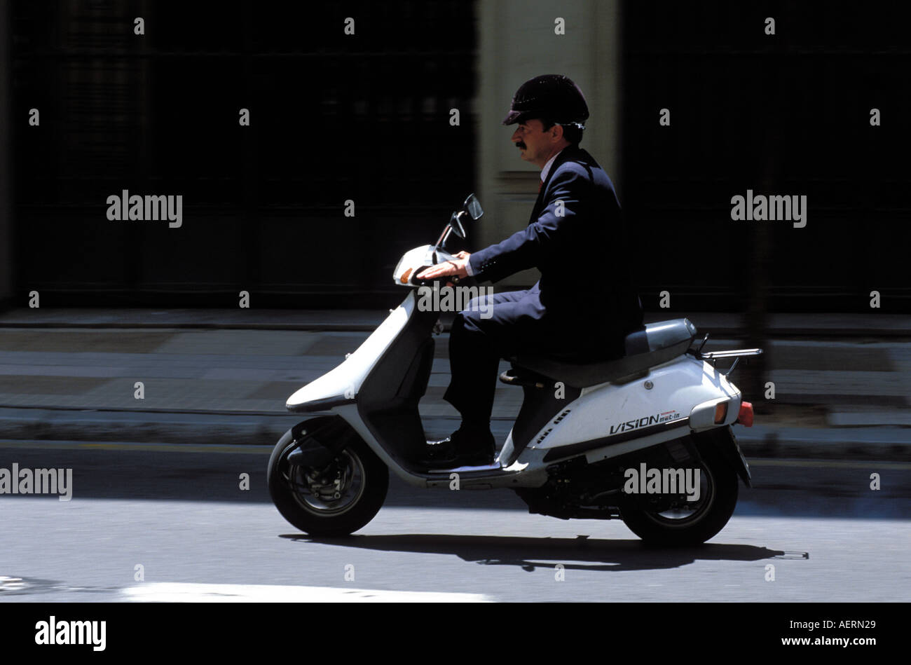 Going to work by scooter Stock Photo