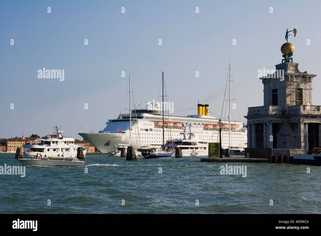 Costa Classica cruise liner arriving in the Canale della Giudecca passes Customs House Venice Italy Stock Photo
