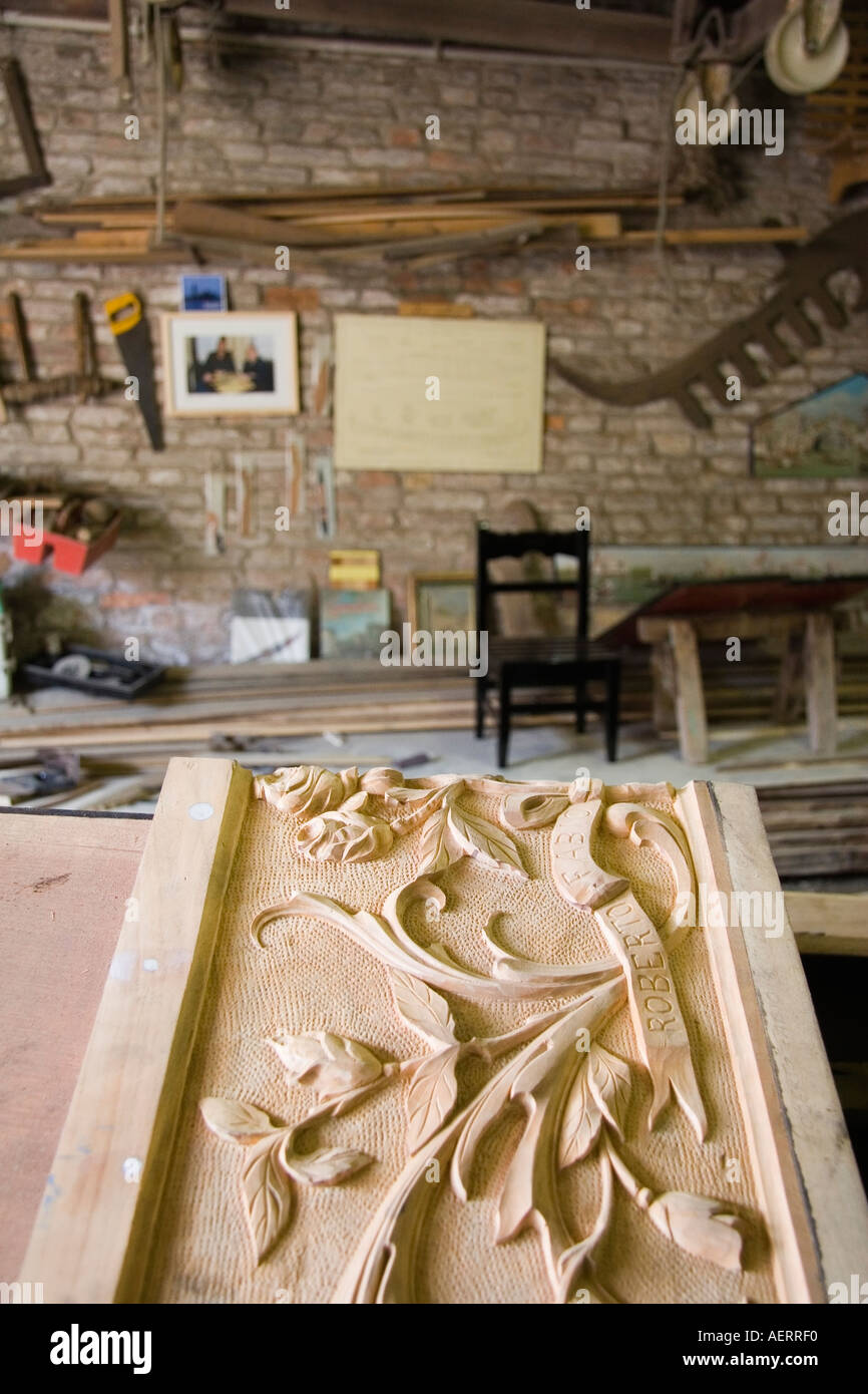Hand carved decorative piece across bow of new gondola at the gondola maker boatyard of D Tramontin Figli Venice Italy Stock Photo